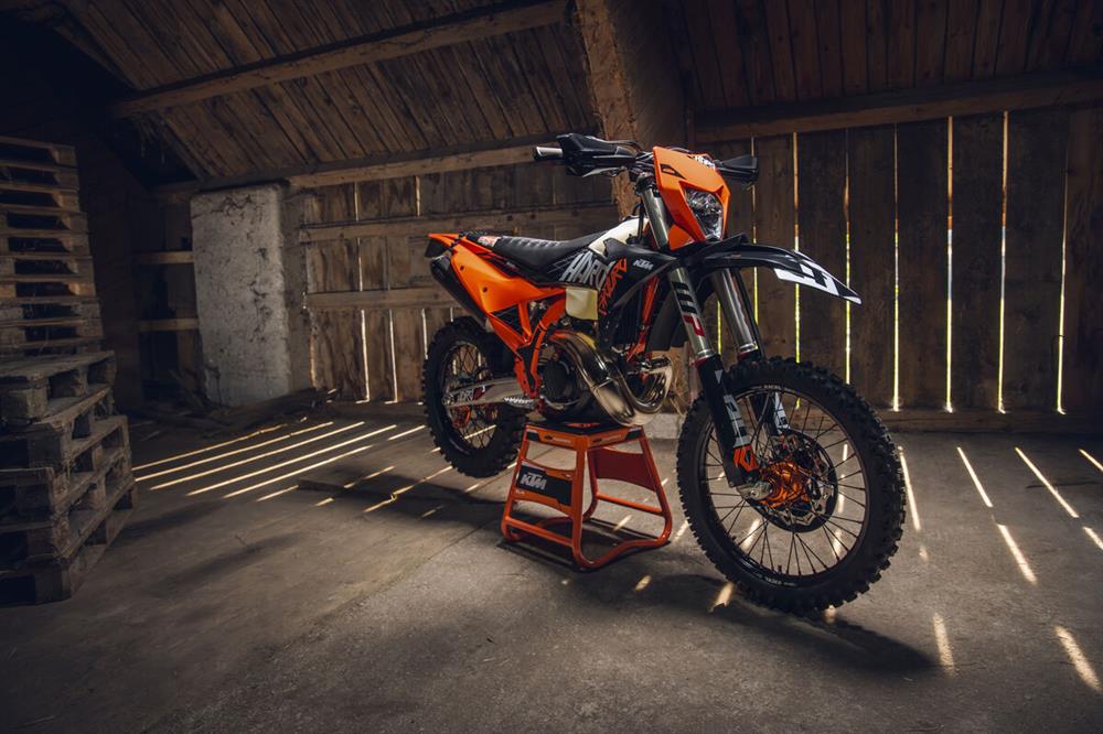 2027 harden enduro in a darkly lit barn